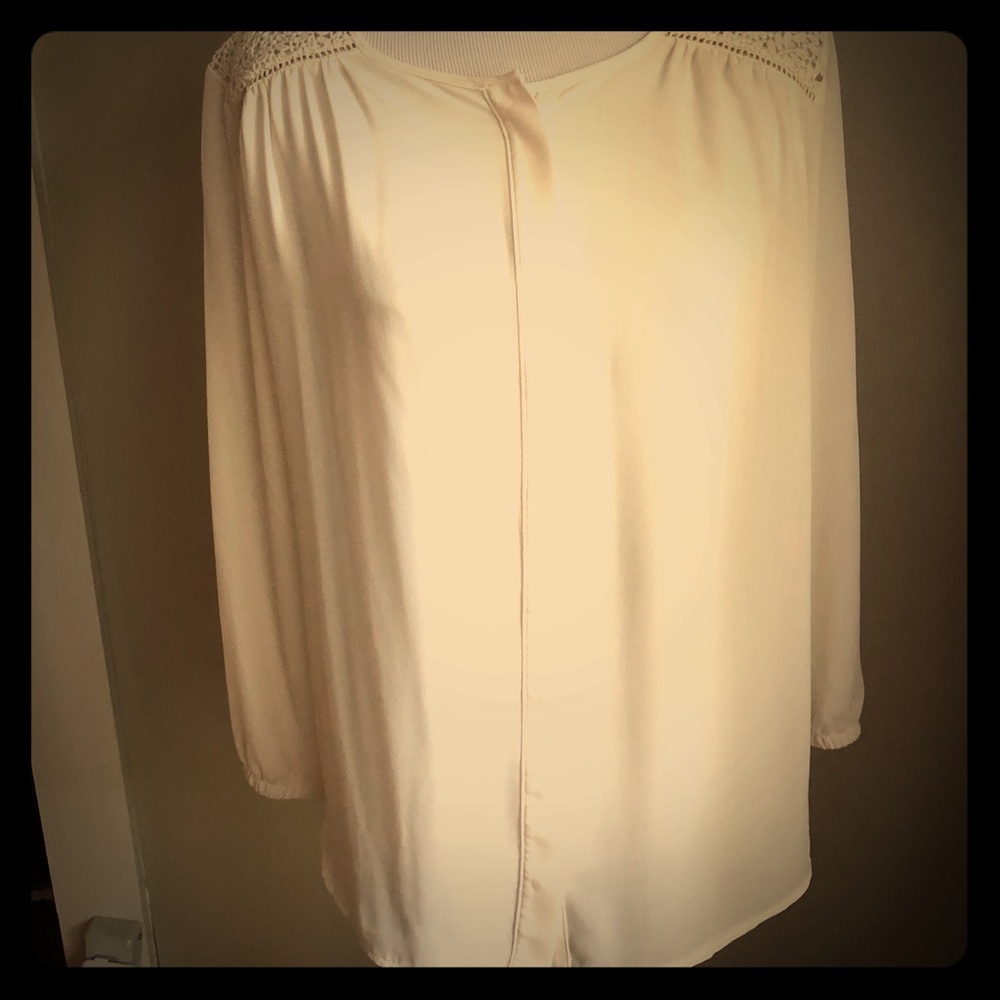 Long sleeve loose fitting lace accent blouse